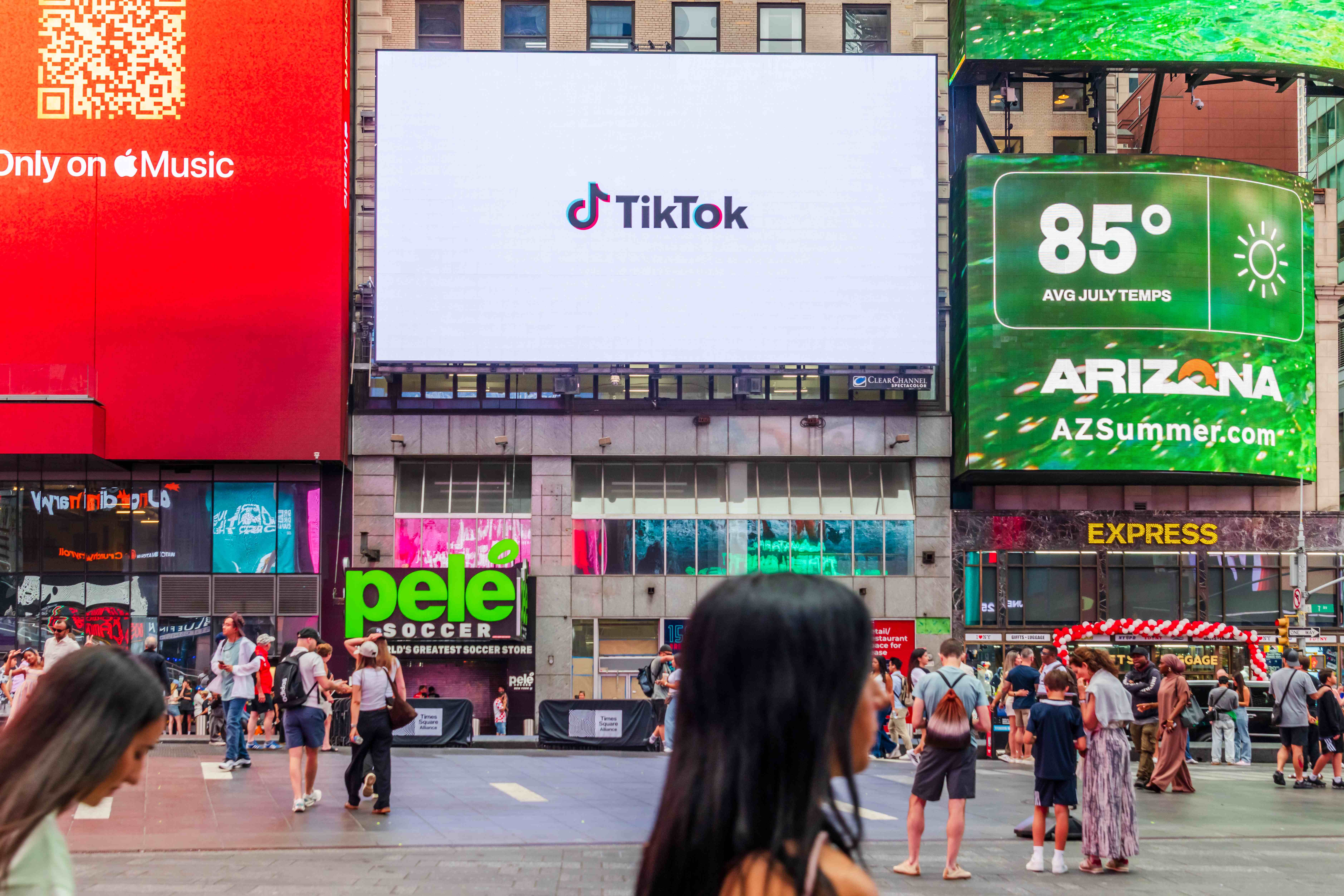 TikTok frame of the GROWUS campaign loop on the 1560 Broadway billboard, Times Square
